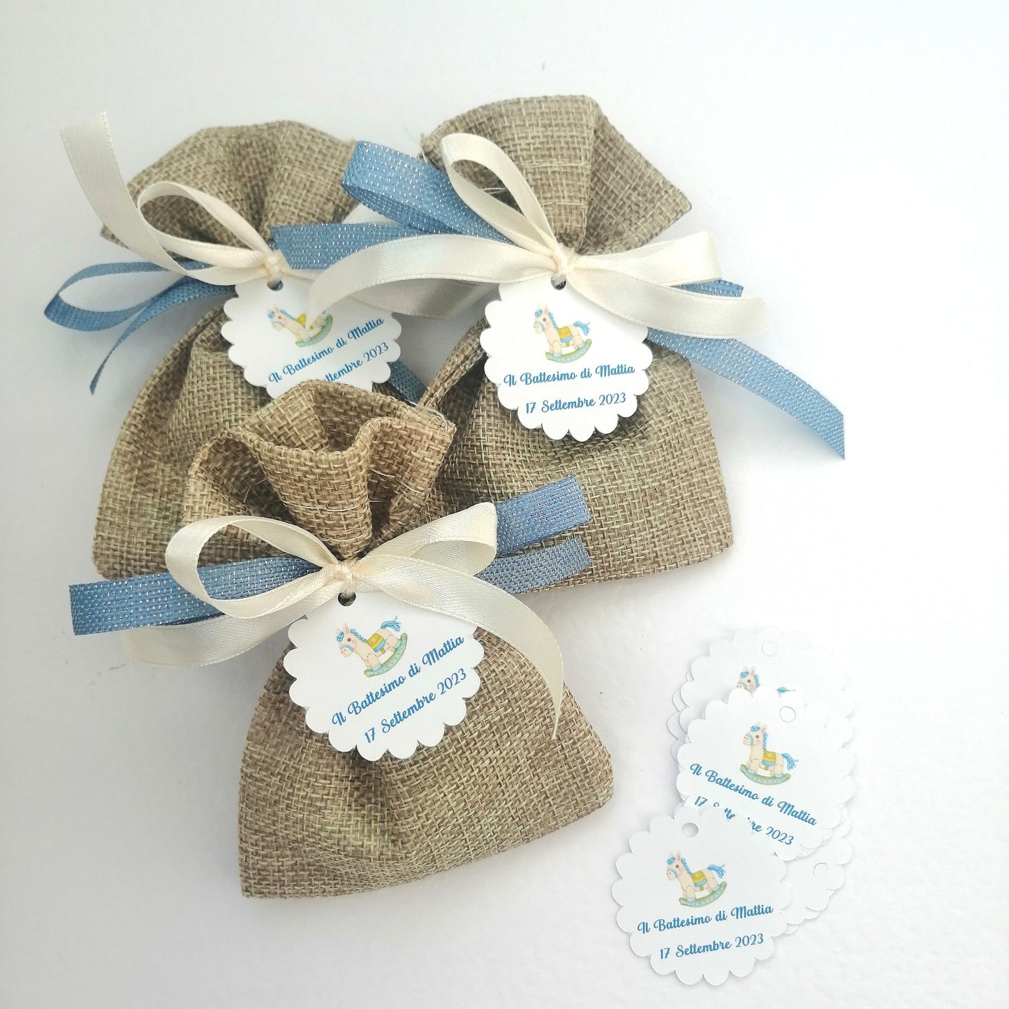 Confetti bag for Births and Baptisms with personalized rocking horse tag