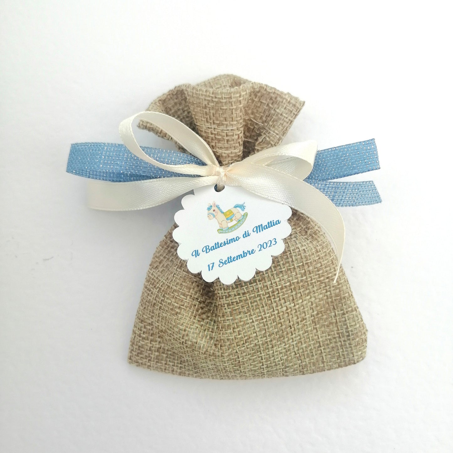 Confetti bag for Births and Baptisms with personalized rocking horse tag